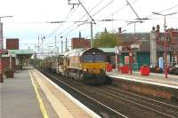 DBS 66069 runs south through Wigan North Western with an infrastucture train on 15 October 2009. The station boasts 6 platforms, 1 the up passenger loop on the far right, 2 & 3 are south facing bays, 4 is the Up Main and 5 the Down Main with 6 as the Down Passenger Loop. Platforms 1 to 3 have access to the lines to Manchester via Bolton or Swinton.<br><br>[John McIntyre 15/10/2009]