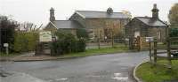 The former station at Nawton on the closed Gilling to Pickering line has been converted into a private residence while the goods yard is occupied by Valley View Lodges holiday accommodation. This south facing view at the station approach was taken on 21 October 2009.<br><br>[John McIntyre 21/10/2009]