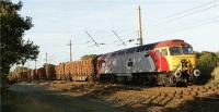 Virgin Thunderbird loco 57305 'John Tracy' crosses Balshaw Lane Junction in the late afternoon sunshine with the Carlisle to Chirk log train on 16 October 2009.<br><br>[John McIntyre 16/10/2009]