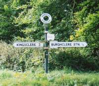 We went looking for bits of this railway which hadn't had the A34 built over them. This road sign to Burghclere station - still pointing the way some 43 years after closure - was a big clue.<br><br>[Ken Strachan 13/09/2009]