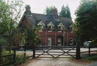 Burghclere station - local pronunciation Burke-lee, as in University of California - is in remarkably good condition, serving as a private house. When we visited, the atmosphere was improved by a procession of vintage motorbikes on the adjacent lane. The gate and cobbled yard are nice touches.<br><br>[Ken Strachan 13/09/2009]