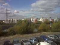 These flats at Freemen's Meadow have covered almost all of the site of Leicester GC shed. Notice the uncompleted flats left of centre. The photograph was taken from the new football stadium. The canalized River Soar in the centre of the picture has had the last laugh, as it has probably changed little in the last 100 years.<br><br>[Ken Strachan 1/10/2009]