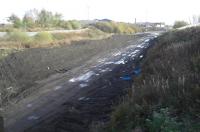 Looking East over the old Dalry line towards Kilmarnock long Lyes (right) and the advancing ballast for the run-round loop (top right).<br><br>[Robert Blane 31/10/2009]