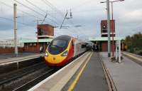 Late afternoon Glasgow bound Pendolino calls at Wigan North Western on 15 October 2009. The Super Sprinter on the right will later set off southwards before swinging west towards Liverpool.<br><br>[John McIntyre 15/10/2009]