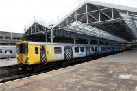 Merseyrail Electrics unit 507008, in <I>Liverpool - European Capital of Culture 2008</I> livery, waits in platform 2 at Southport for its next run to Liverpool on 15 October 2009. <br><br>[John McIntyre 15/10/2009]