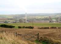 View west over part of the 500 acre Cleveland Potash complex near Boulby, north east Yorkshire, in October 2009. The deepest mine in Britain by far at 4,600 feet (and second deepest in Europe), construction began here in 1969 and production of potash, a key ingredient in agricultural fertilizer, commenced in 1973. A secondary product from the Boulby mine is rock salt, which is also produced in high volumes. The site generates large amounts of rail freight traffic, handled via a link to Teesside along the route of the former Whitby, Redcar and Middlesbrough Union Railway, closed in 1958 but reopened from a junction west of Saltburn when production commenced here in 1973. Because of its depth, the site is also home to the UKs Zeplin-III dark matter detector, which is housed in the Boulby Underground Laboratory. Now wash your hands please. [See image 33493]    <br>
<br><br>[John Furnevel 13/10/2009]