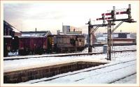 Midway through the afternoon on a wintry November day in 1973, D3877 shunts vans in Guild Street yard, alongside Aberdeen station.<br><br>[John McIntyre /11/1973]