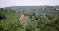 The route from the china clay pits to St Blazey and Par was originally a  tramway which crossed this valley on the Treffry Viaduct before  descending an incline to Ponts Mill. The line now climbs steeply up to  Luxulyan and is even used by HSTs on summer Saturdays en route to  Newquay. This picture taken from the viaduct looking NE in September 1962. <br><br>[John Thorn /09/1962]