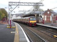 On 28 October 2009, unit 320 305 picks up at Sunnyside with a Helensburgh service. For some reason its numbers on this end have been peeled off.Though almost identical to Class 321s, used by several operators in England, 320s are exclusive to the North Clyde Lines; they are unable to use the linked Argyle Line due to clearance restrictions, so while other classes are found north of the Clyde (routinely on the Milngavie branch) the reverse doesn't apply. <br>
<br><br>[David Panton 28/10/2009]