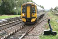 View south from Dingwall station as the 1101 Inverness - Dingwall service runs slowly towards its destination on 1 October 2009. <br><br>[John Furnevel 01/10/2009]