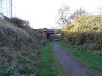 Trackbed of the Caledonian's Leith Goods Branch - looking south west under Lochend Road on 31 0ctober 2009. The Leith Central branch crossed over just beyond the road bridge.<br><br>[David Panton 31/10/2009]