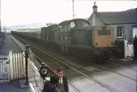 The last scheduled freight to Hawick photographed in April 1969 on the level crossing at Heriot.  <br><br>[Bruce McCartney /04/1969]