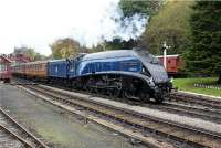 Sir Nigel brings a southbound train into Goathland on 18 October 2009. The leading carriages are LNER teak stock which look the part, especially with an A4 on the front even when it is in post Nationalisation Blue.<br><br>[John McIntyre 18/10/2009]