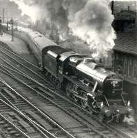 Stanier Black 5 no 45468, immaculately turned out by St Rollox shed, takes the <I>'Fife Coast Express'</I> out of Buchanan Street in 1959 at the commencement of its cross-country journey to St Andrews [see image 34385]. Even the signalman seems impressed.<br>
<br><br>[Gordon Smith Collection (Courtesy Ken Browne) //1959]