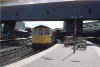 A Class 33 waits at the north end of Bristol Temple Meads station in May 1985 with a train for Cardiff.<br><br>[John McIntyre /05/1985]