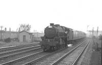 Stanier Black 5 4-6-0 no 45361 runs through Hillington West on the up fast one evening in May 1963 with empty coaching stock.<br><br>[Colin Miller /05/1963]
