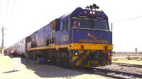 This is Cook in the middle of the Nullarbor with the eastbound <i>Indian Pacific</i> from Perth to Adelaide and Sydney on 25th September 2008. A well named location - step out of the aircon into 30-odd degrees. An abandoned railway town, the population varies from 2 to 4, apparently. The train consists of 23 stainless steel cars and three car carrier wagons.<br>
<br><br>[Colin Miller 25/09/2008]