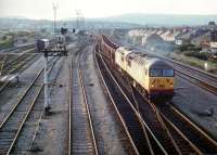 Rolling thunder - the Llanwern ore trains headed by two 56's used to burst out of Hillfield tunnels sounding like Concorde on reheat. The size of Llanwern steelworks (proposed 1862, built 1962) can be judged by the fact that this train is about to turn right through ninety degrees, and will easily be contained within the works.<br><br>[Ken Strachan //1988]