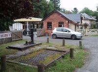 The old weighbridge at Erwood is a significant relic from the past that has survived to become a feature at the craft centre. The trackbed from here towards Brecon has been turned into a public road as far as Llanstephan, complete with original bridges, and is an interesting alternative to the 'A' road. <br><br>[Mark Bartlett 17/09/2009]