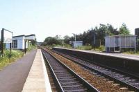 Opened in 1852 by the Oxford, Worcester & Wolverhampton Railway (and originally named Churchill & Blakedown) the once rural Blakedown is now an increasingly busy station serving the Birmingham commuter belt on the line to Kidderminster. View from the level crossing in 1982 looking north east towards Birmingham.    <br>
<br><br>[Ian Dinmore //1982]