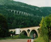 A very artistic arrangement of viaducts on the line from Andelot to La Cluse in the Jura mountains - quite near Geneva by car, not so easy by train. The speed limit for pedestrians crossing the road seems like a good idea.<br><br>[Ken Strachan 12/09/2009]