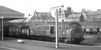 An NBL Type 2 shunts Arbroath goods yard in 1969. A St Rollox driver was once asked <I>What's the best thing about these NBL Type 2s?</I> To which he replied without hesitation <I>The fire extinguisher - I use it more often than the throttle.</I> This no doubt referred to the examples which were not re-engined.<br><br>[David Spaven //1969]