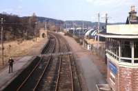 Platform scene at Grantown-on-Spey West - with its now sadly gone <I>art deco</I> style signal box - photographed in April 1968, three years after closure (complete with a young DS on the platform!). A recent 5m appeal has been launched to extend the Strathspey Railway from north of Broomhill back to this site. [See news item]<br>
<br><br>[Frank Spaven Collection (Courtesy David Spaven) /04/1968]