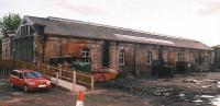 Here is that very sad sight, a former junction station, now completely disconnected. However, the trackbed is walkable in parts, there are restored locomotives and wagons on site; and although this view is hardly pristine, the site is at least tidier than it was a few years ago. The 0-2-2 Astra class seen to the left is mercifully no longer our transport.<br><br>[Ken Strachan 10/05/2009]