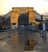 Work underway at Glasgow Central on 13 November 2009 involving demolition and clearance of the various structures that have appeared over the years around the base of the station arch on platforms 11 & 12.  Further reconstruction work will result in rails being routed through the arch into the the new platforms that will eventually occupy the area previously used as the station car park.<br>
<br><br>[Graham Morgan 13/11/2009]