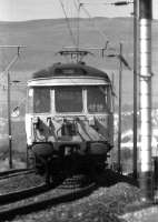 An eastbound service for Airdrie via Singer formed by unit 049 comes to the end of the Ardmore West straight before swinging right towards Ardmore East in the summer of 1975.<br><br>[John McIntyre //1975]