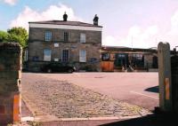 This marvellous former station is now a Travelodge hotel and Italian restaurant. Here is the front entrance - the left hand gatepost being more convincing than the right. The restaurant (r) seems to be in the former passenger platform area, which closed to passengers 152 years ago!<br><br>[Ken Strachan 11/05/2009]