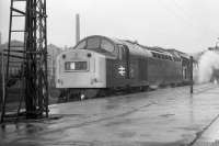 Class 40 no 366 departs south from a wet and cold Aberdeen in November 1972. Thankfully for the passengers the steam heat appears to be working.<br><br>[John McIntyre /11/1972]