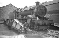 Ex-GWR 4-6-0 no 6992 <I>Aborfield Hall</I> photographed on the turntable at Hereford shed (85C) in the late 1950s.<br><br>[Robin Barbour Collection (Courtesy Bruce McCartney) //]