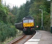 47826 brings up the rear of an SRPS railtour returning from Kyle of Lochalsh to Paisley Gilmour Street on 26 September 2009. The train is seen here passing through Achnashellach station with 47786 on the leading end.<br><br>[John Furnevel 26/09/2009]