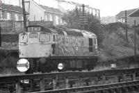 27023 is seen moving between Ferryhill SB (to the right) and Ferryhill MPD (to the left) in 1974.<br><br>[John McIntyre //1974]