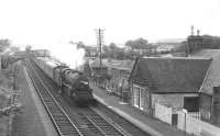 A summer only Blackpool - Glasgow train, with 45444 in charge, runs through Lochside in July 1966, a month after the station had reopened to passenger services, having been closed since 1955.<br>
<br><br>[Colin Miller /07/1966]