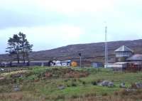 Probably the loneliest loop in Britain - a lightly-loaded northbound freight creeps through Corrour in 1998.<br>
<br><br>[David Spaven //1988]