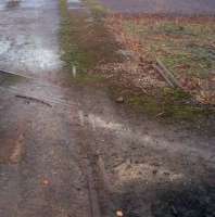 Shades of Porthmadog: narrow gauge dram (tub) track crossing standard gauge railway. Notice the check rails on both lines. The mine closed in 1989. <br><br>[Ken Strachan 24/11/2009]