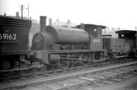 Ex-St Margarets Y9 0-4-0ST no 68118 amongst the lines of locomotives stored in Bathgate yard in April 1959.<br><br>[Robin Barbour Collection (Courtesy Bruce McCartney) 21/04/1959]