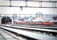 A train leaves Oslo Ostbanen for Trondheim in July 1967. The area has since been subsumed within a new central station at the heart of which the old trainshed still stands. <br><br>[Colin Miller /07/1967]