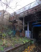 47 years on from the closure of Newhaven station the main building is still there, as is the Edinburgh-bound platform, but the Stairs down from the ticket office to the platform are long gone. The top supports however remain, as does the bridge number apparently covering both the ticket office bridge and the substantially separate Craighall Road bridge. <br><br>[David Panton 25/11/2009]