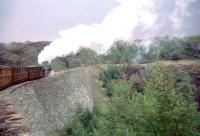 Scene on the Ffestiniog Railway in May 1968 as a Fairlie heads a train across Cei Mawr (=Big Wall) - built without  mortar! <br><br>[John Thorn /05/1968]