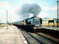 Stanier Coronation Pacfic no 46243 <I>City of Lancaster</I> storms through Symington on 29 August 1959 at the head of the up <I>Royal Scot</I>.<br><br>[A Snapper (Courtesy Bruce McCartney) 29/08/1959]