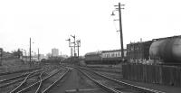 A Brush Type 4 in two tone green approaches Aberdeen Ferryhill SB with a northbound service in June 1973. This view is taken from the approaches to Ferryhill MPD and Ferryhill SB can be seen on the left of the photograph.<br><br>[John McIntyre 03/06/1973]