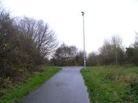 The site of Trinity Junction looking south on 25 November 2009. The removal of old embankments and bridge remains together with subsequent landscaping have made the location barely recognisable when compared with the same viewpoint in March 1986 [see image 20393].<br><br>[David Panton 25/11/2009]