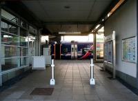 North entrance to Edinburgh Park station on 27 November 2009, with a Bathgate - Edinburgh Waverley service about to leave platform 1.<br><br>[John Furnevel 27/11/2009]