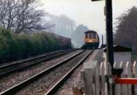 I think I can, I think I can - this Cardiff-bound DMU seemed to be struggling to reach the summit just North of Onibury crossing, between Ludlow and Shrewsbury. The station building was a B&B at this time, but as I had relatives close by, I always stayed with them instead.<br><br>[Ken Strachan /04/1987]