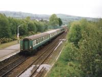 The 19.14 train to Kyle of Lochalsh leaves Dingwall behind a class 37 on 12 May 1993. Note the Kyle Line coaching stock in use at the time.<br><br>[Ken Browne 12/05/1993]