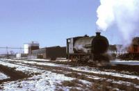 Courtaulds' resident Peckett (2087/1948) shunter, apparently known as <I>Miranda</I>, stands in the factory sidings on a cold day in 1968, the year in which it was replaced by a diesel shunter. This view looks back towards the BR exchange sidings on the Preston to Longridge branch, which ran at right angles to these lines.  <br><br>[David Hindle //1968]