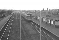 Glasgow-bound DMU at Hillington West in August 1966.<br><br>[Colin Miller /08/1966]